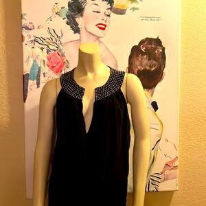 Beautiful Robert Rodriguez blouse.